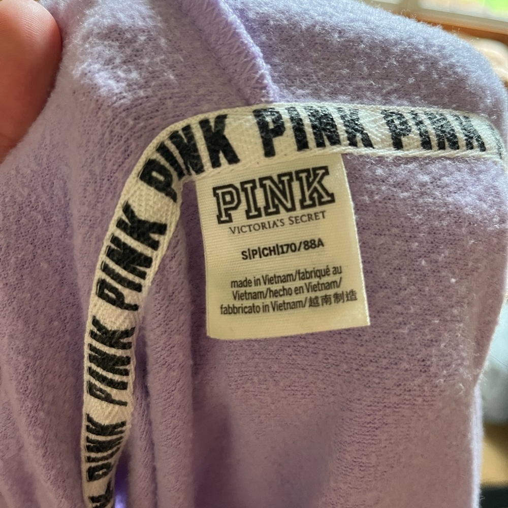 Purple and green zip up from pink
